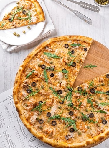 delicious pizza slice served bethnal green.jpg